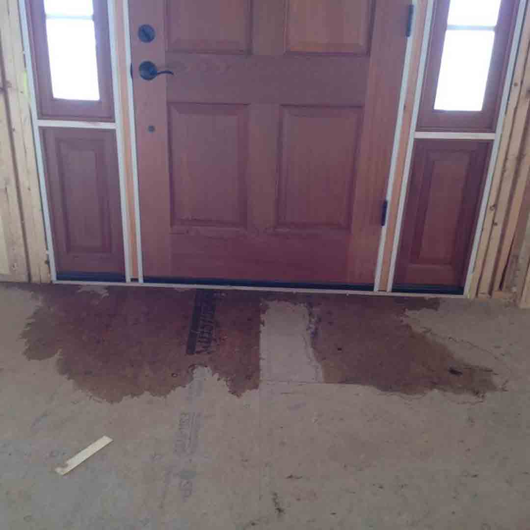 water leaking under entry door