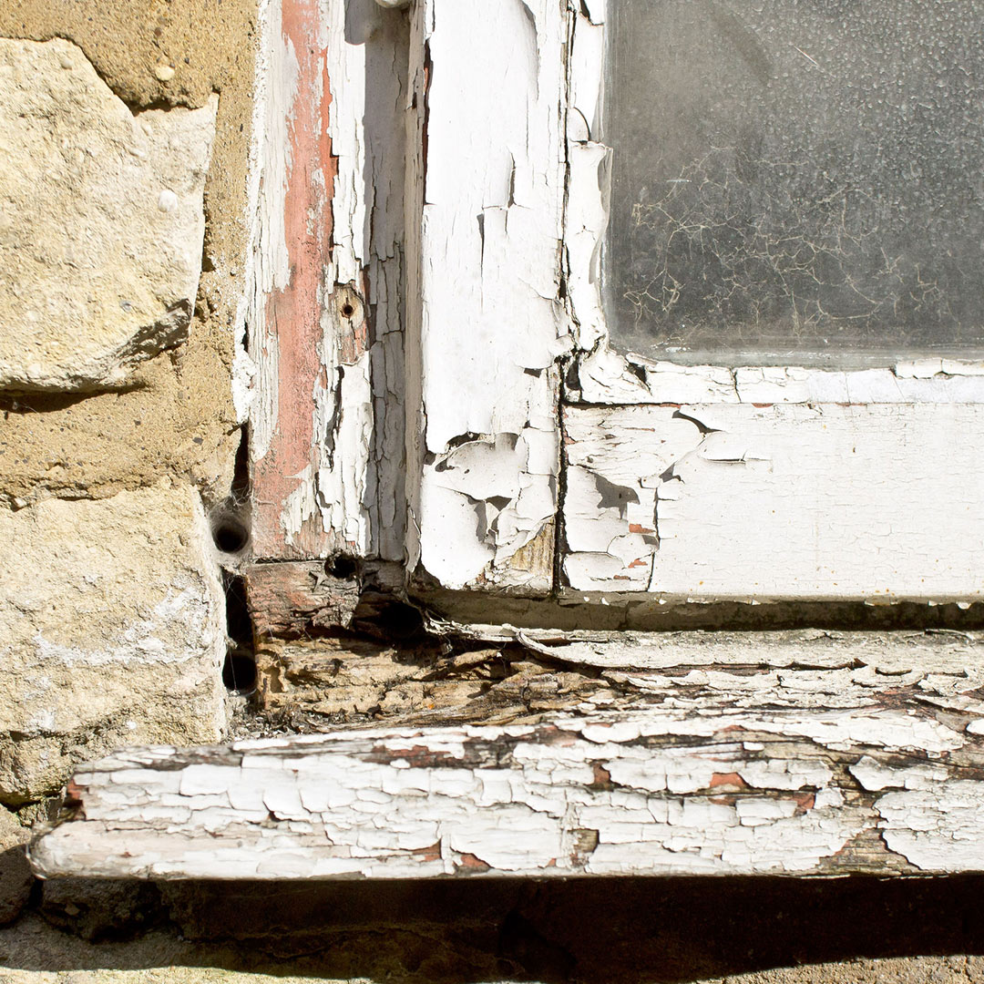 old window frame rotting, paint chipping