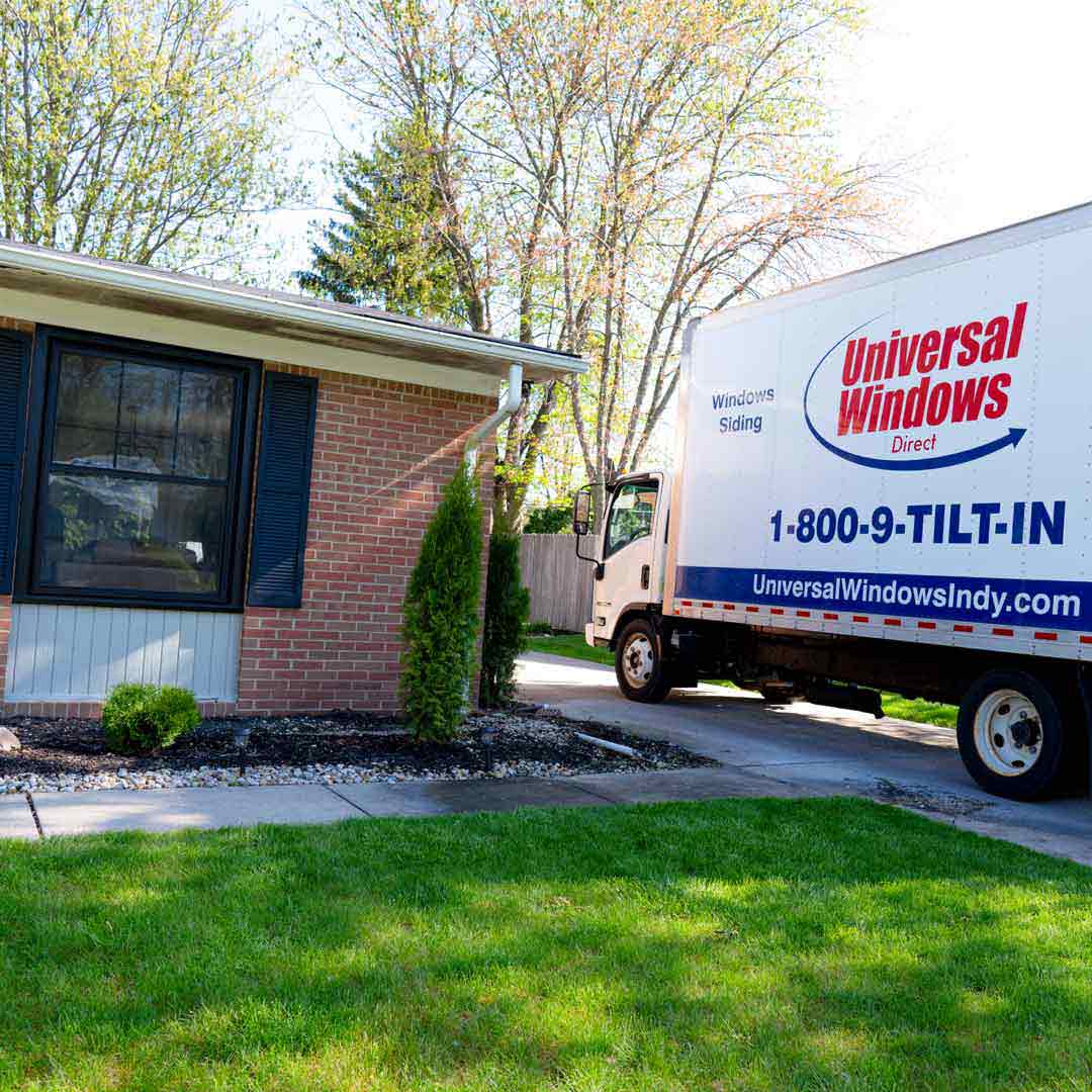 Universal Windows Direct truck in homeowners driveway