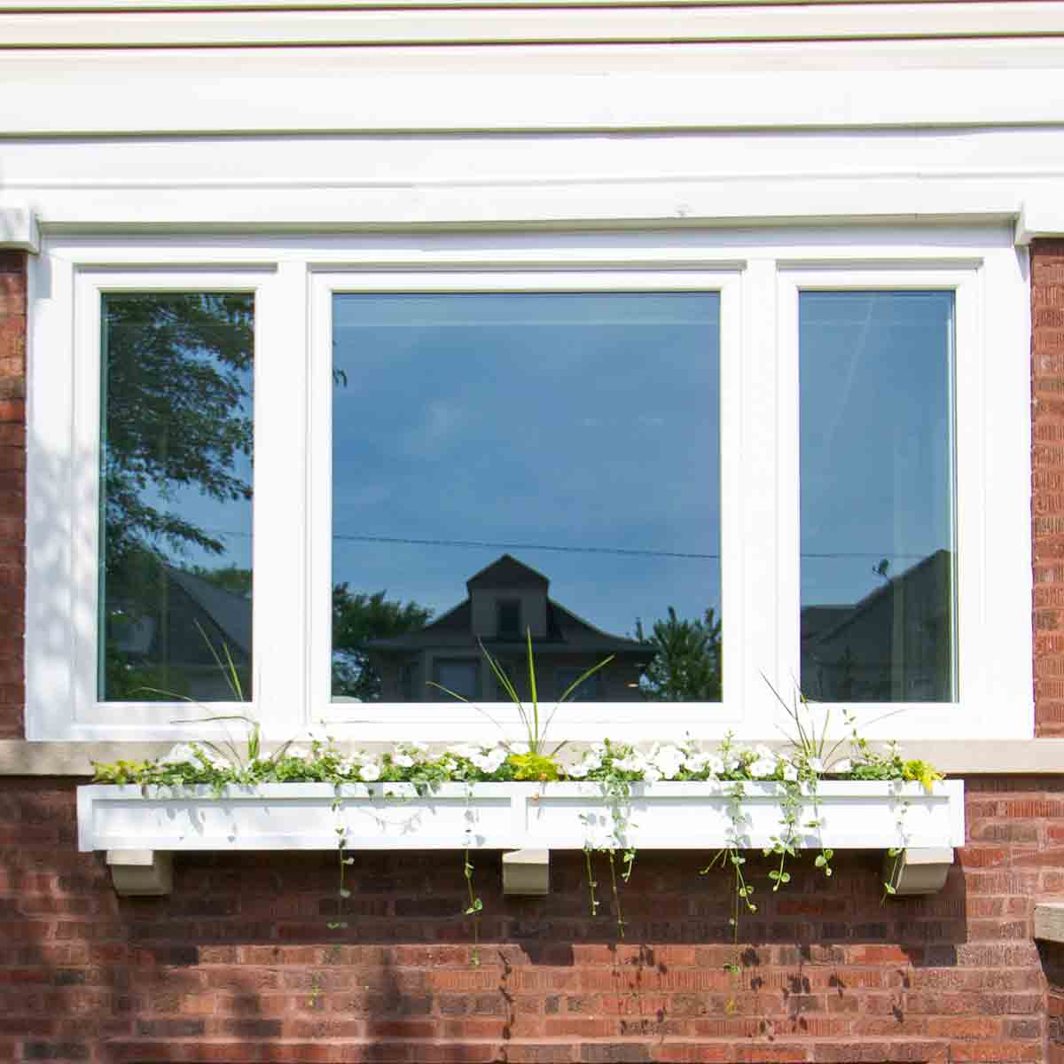 3-lite slider vinyl replacement window with window box