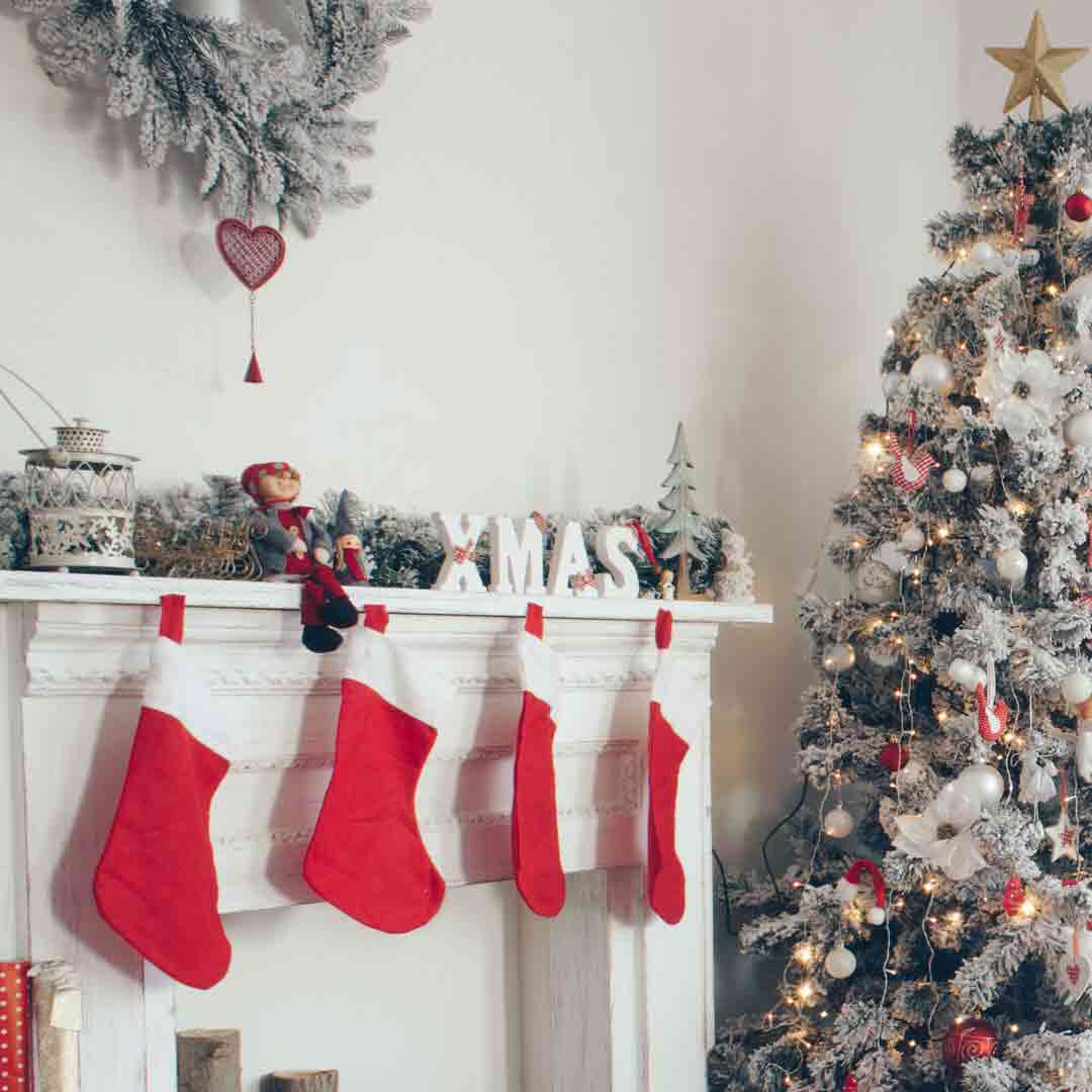indoor christmas stockings hung by the fireplace, christmas tree