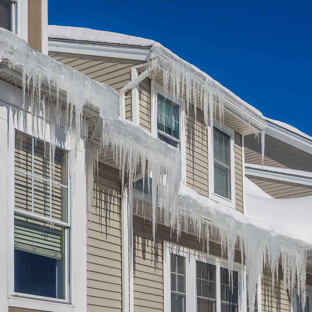 ice dam overflowing gutters