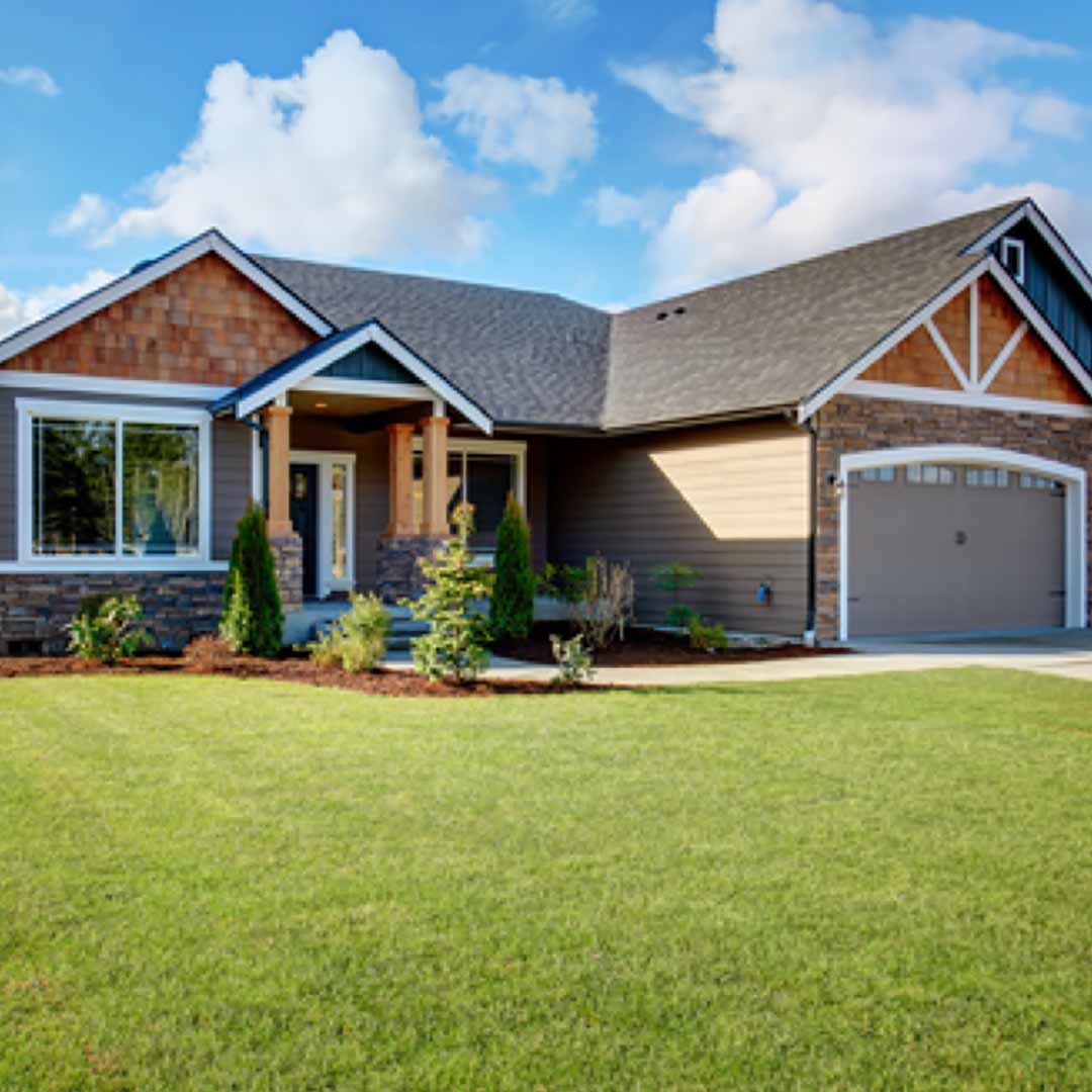 rustic, ranch style home with vinyl cedar shakes